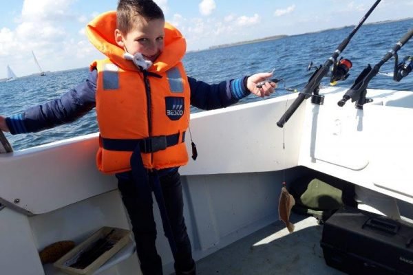 Tom, bootvissen op de Oosterschelde