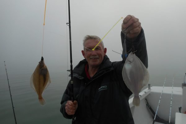 Henry, Jack en Peter, met de mist, de boot in